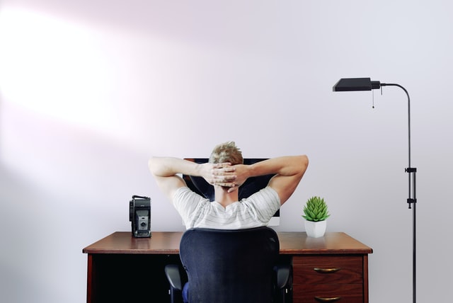 Man sitting at desk confused about what to write about next